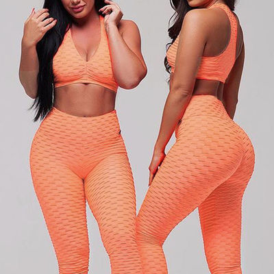Η ραβδωτή Sportswear γιόγκα γυμναστικής ντύνει τις άνευ ραφής περικνημίδες Workout για τις γυναίκες