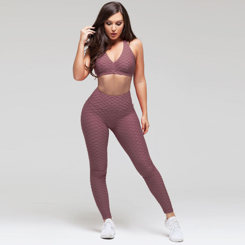 Η ραβδωτή Sportswear γιόγκα γυμναστικής ντύνει τις άνευ ραφής περικνημίδες Workout για τις γυναίκες