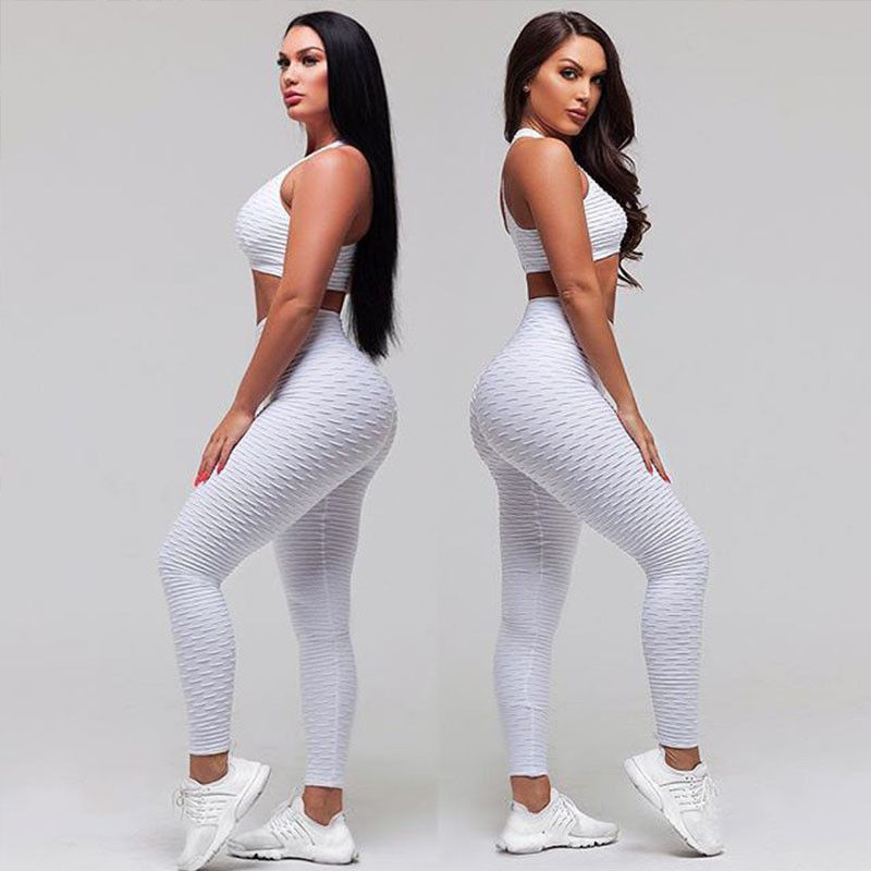 Η ραβδωτή Sportswear γιόγκα γυμναστικής ντύνει τις άνευ ραφής περικνημίδες Workout για τις γυναίκες