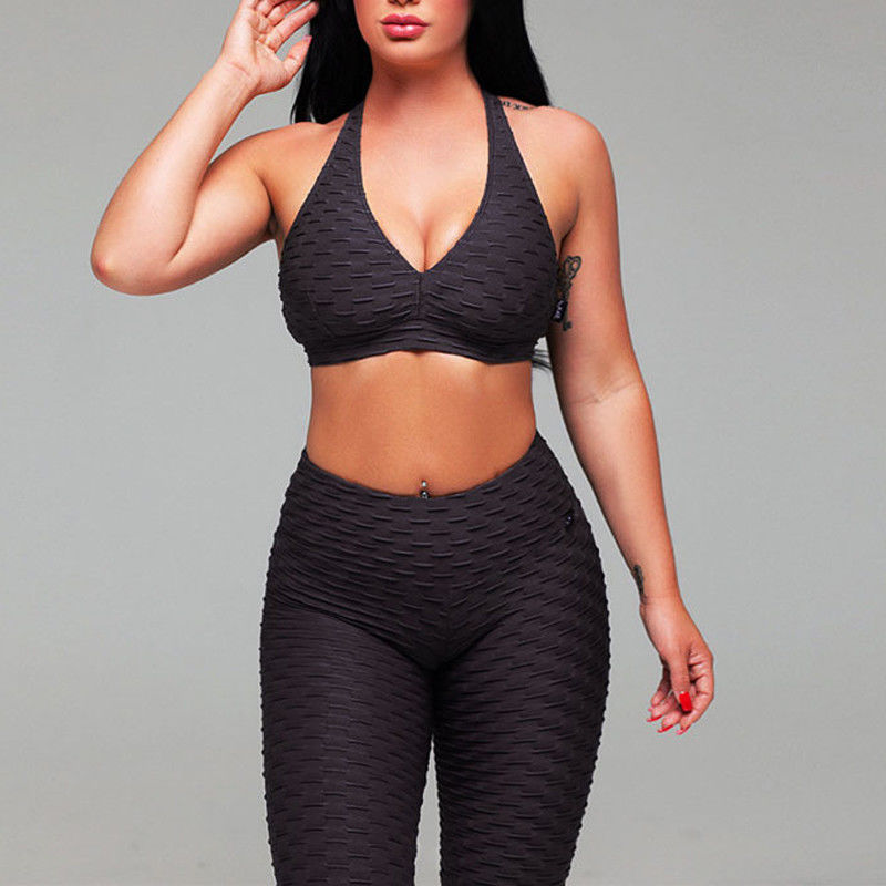Η ραβδωτή Sportswear γιόγκα γυμναστικής ντύνει τις άνευ ραφής περικνημίδες Workout για τις γυναίκες